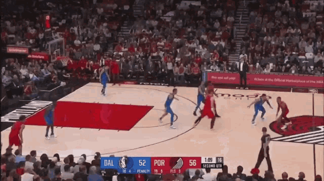 a basketball game is underway and the score is 52 to 56