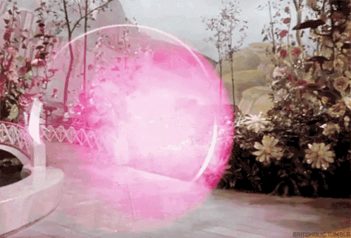 a pink bubble is surrounded by flowers and trees and says britaholic tumblr on the bottom