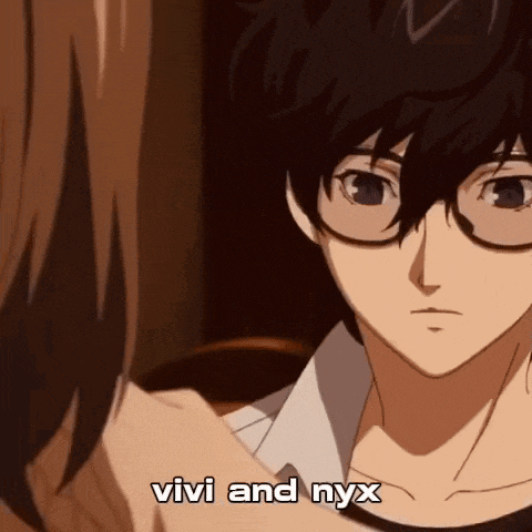 a man with glasses is talking to a woman and the words vivi and nyx are visible