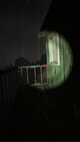 a blurry picture of a building with a window