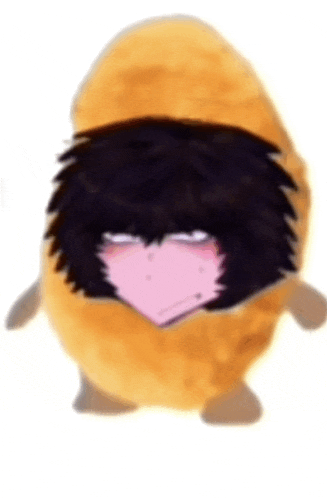 a stuffed animal that looks like a person with black hair