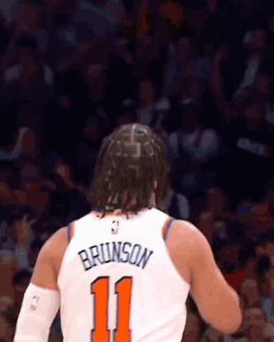 a basketball player wearing a jersey with the number 11 on it