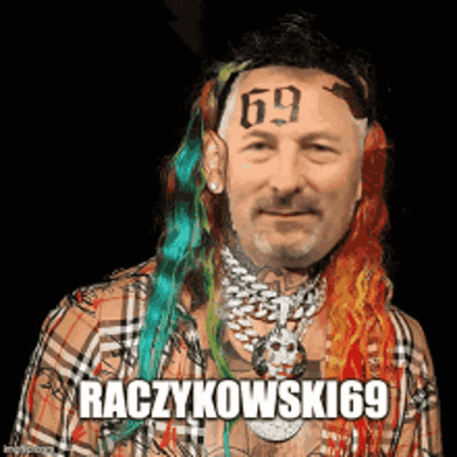 a man with rainbow hair has the number 69 tattooed on his head