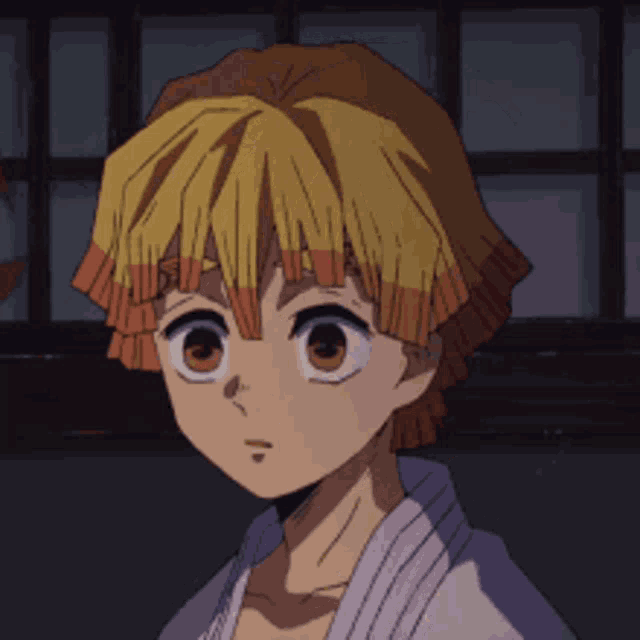 a close up of a cartoon character with a surprised look on his face .