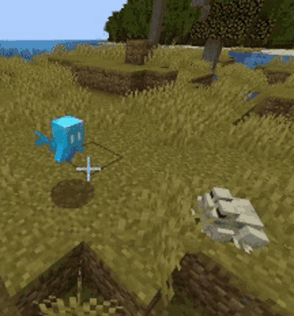 a blue fish and a white frog in a minecraft game