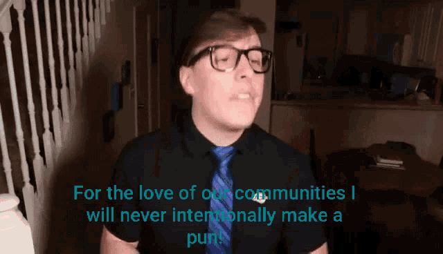 a man wearing glasses and a tie says for the love of our communities i will never intentionally make a pun