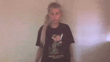 a girl wearing a black shirt that says high again on it
