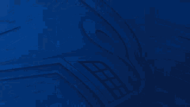 a blue and white poster with the name luke schenn on it
