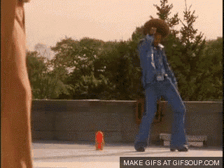 a make gifs at gifsoup.com screenshot of a man dancing on a roof