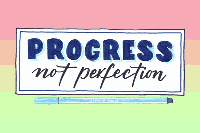 a sign that says progress not perfection next to a blue stabilo pen