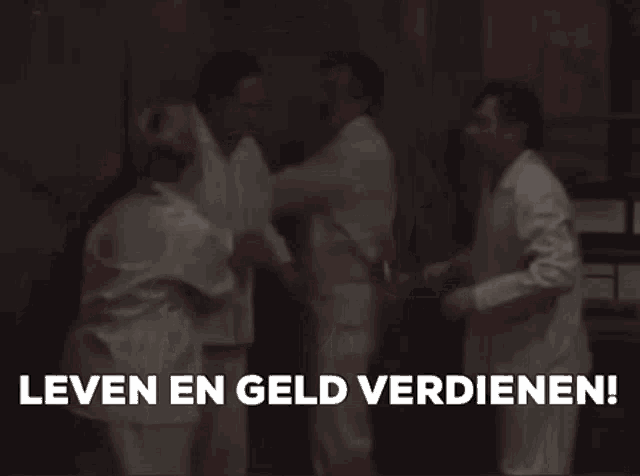 a group of men are standing in a room with the words leven en geld verdienen