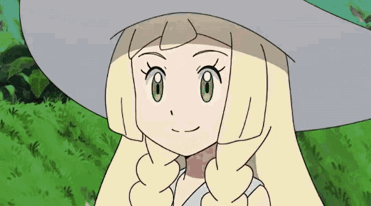 a cartoon girl with blonde hair and green eyes wearing a white hat .