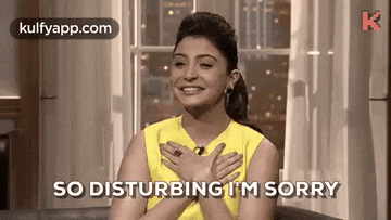 a woman is sitting in a chair with her hands on her chest and says `` so disturbing i 'm sorry ''