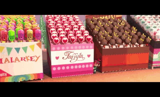 a display of candy with a sign that says taffy