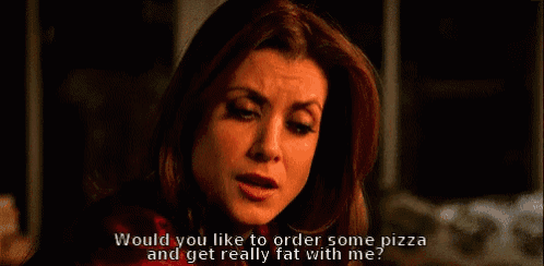 a woman says " would you like to order some pizza and get really fat with me " in a dark room