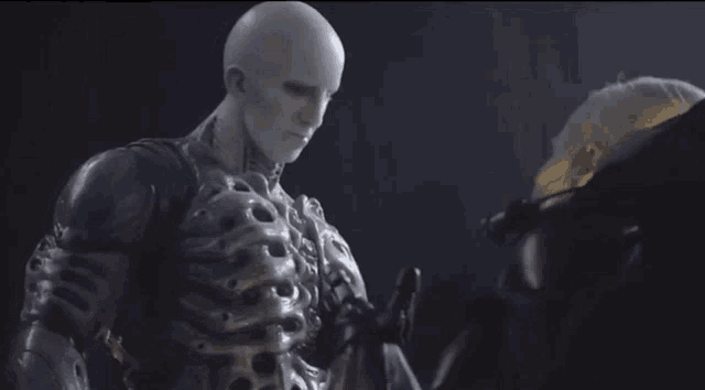 a statue of a man with a skull on his head