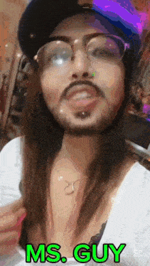 a man with glasses and a beard says ms guy