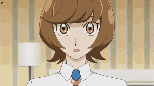 a girl with brown hair and a white shirt and tie looks at the camera with the words vs below her