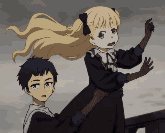 a girl with blonde hair is being held by a boy