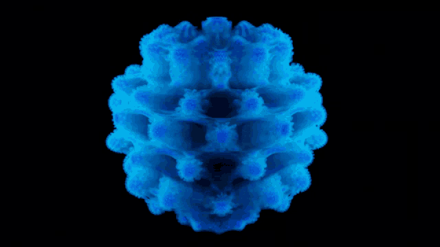a blue object on a black background that looks like a flower