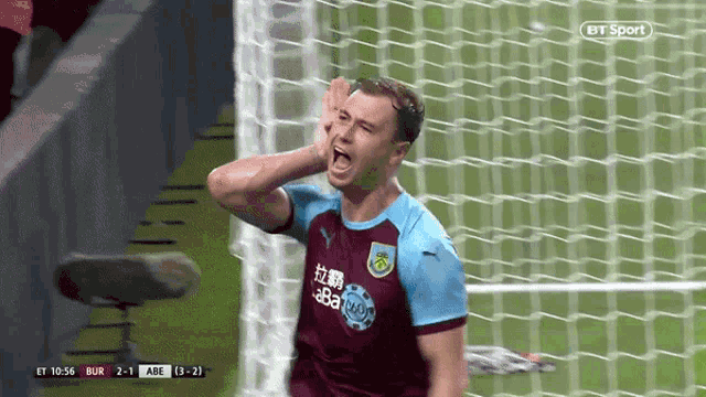 a soccer player celebrates a goal during a bt sport match