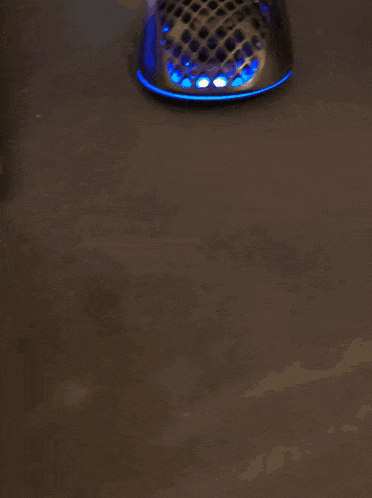 a webcam is sitting in front of a keyboard