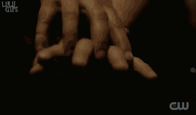 a woman is laying down with her eyes closed and the words lulu gifs on the bottom right