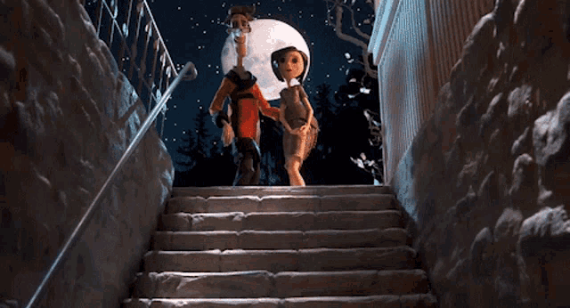 a man and a woman are walking down a set of stairs