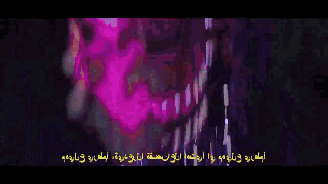 a close up of a woman with blood on her face smiling