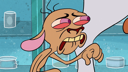 a cartoon character with a very funny face is holding something