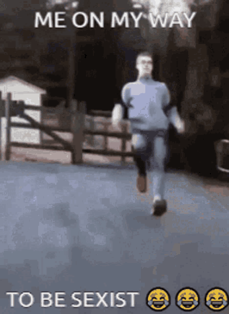 a man is running down a road with the words me on my way to be sexist