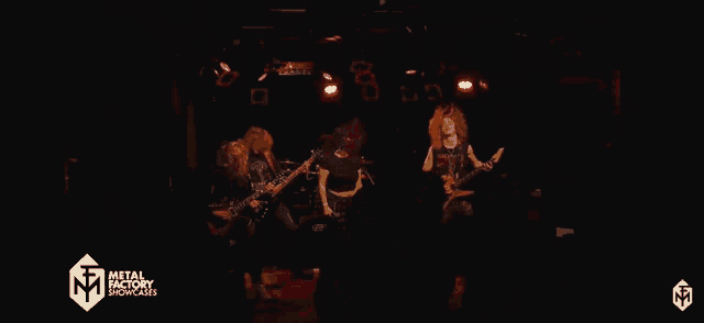 a metal factory showcase is being advertised on a dark stage