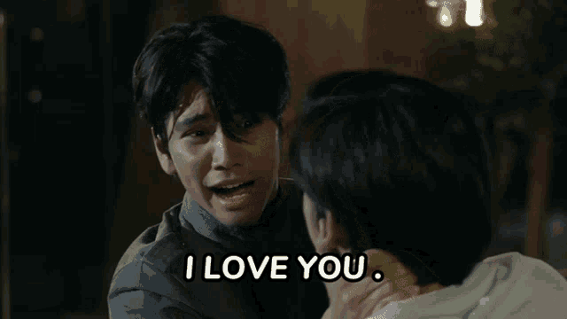 a man says " i love you " while another man looks on