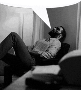 a man is laying down with a speech bubble above him