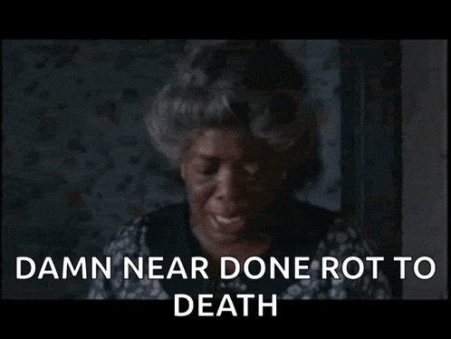 a woman is crying with the words " damn near done rot to death " behind her