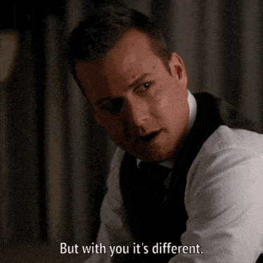 a man in a white shirt and black vest says but with you it 's different