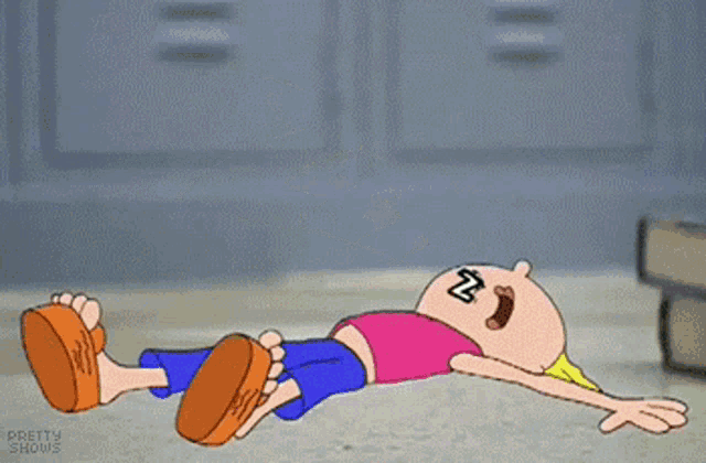 a cartoon character is laying on the ground with his mouth open and the word zzz coming out of it .