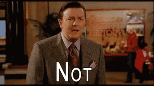 a man in a suit and tie says " not "