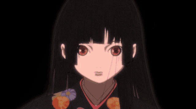 a girl in a kimono holds a bouquet of flowers in her hand