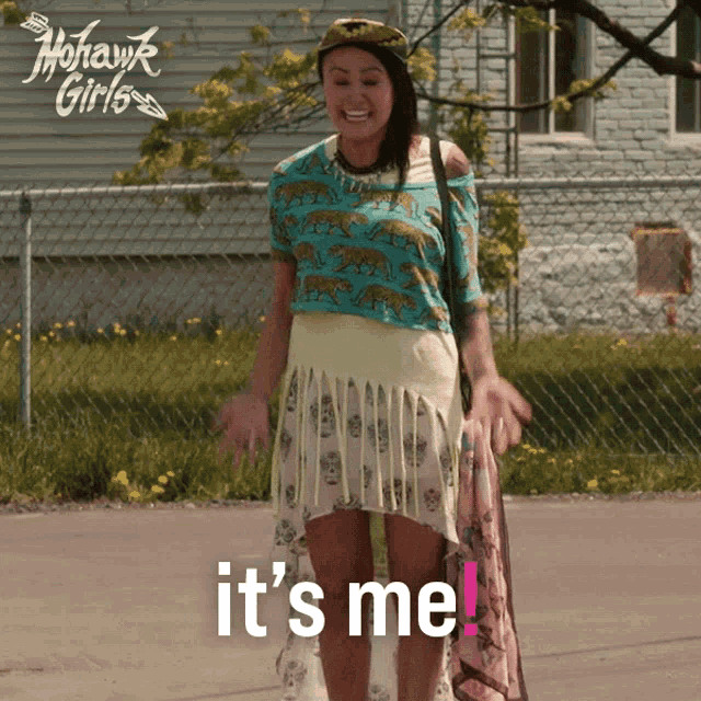 a mohawk girl says it 's me while standing on the street