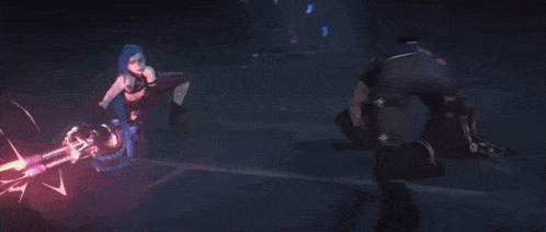 a man and a woman are fighting in a dark room .