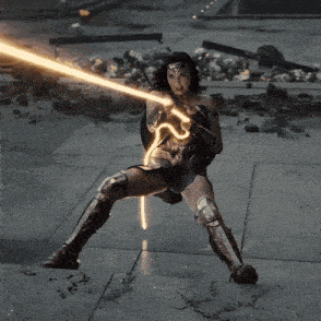 a woman in a superhero costume is holding a light sword