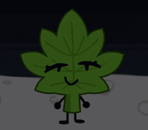 a green leaf with a surprised face on it