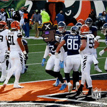 a football player with the number 86 on his back is surrounded by other players