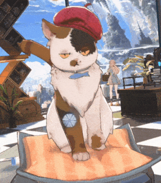 a cat wearing a red hat is standing on an orange cushion