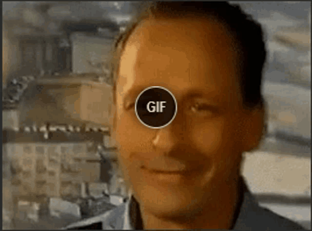 a close up of a man 's face with a gif circle around his eyes