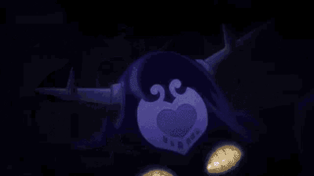 a purple circle with a white light inside of it on a dark background .