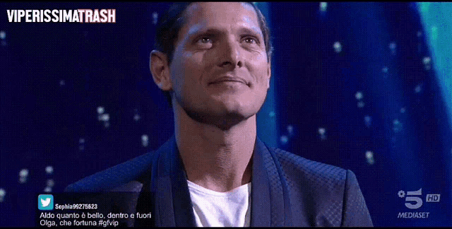a man 's face is shown on a screen with the words viperissimatrash