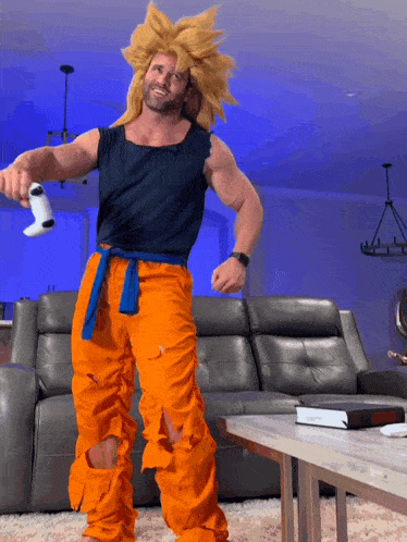 a man in a costume is holding a game controller