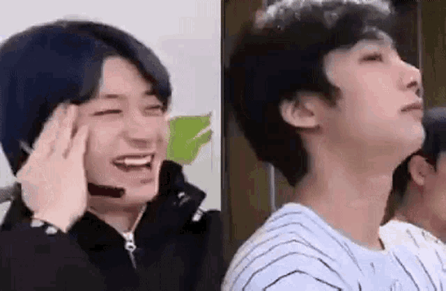 a man with a microphone on his head is laughing next to another man .